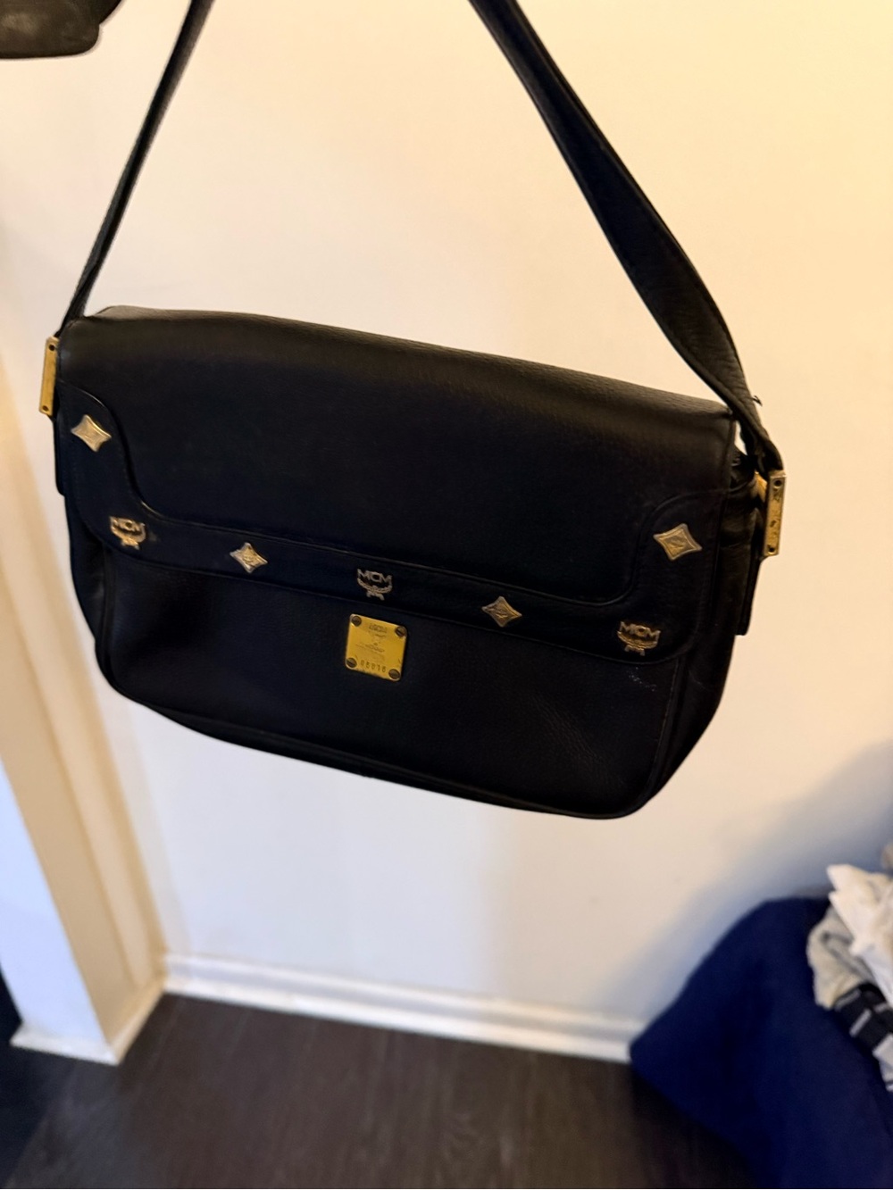 MCM Black Leather Messenger Bag with Gold Hardware